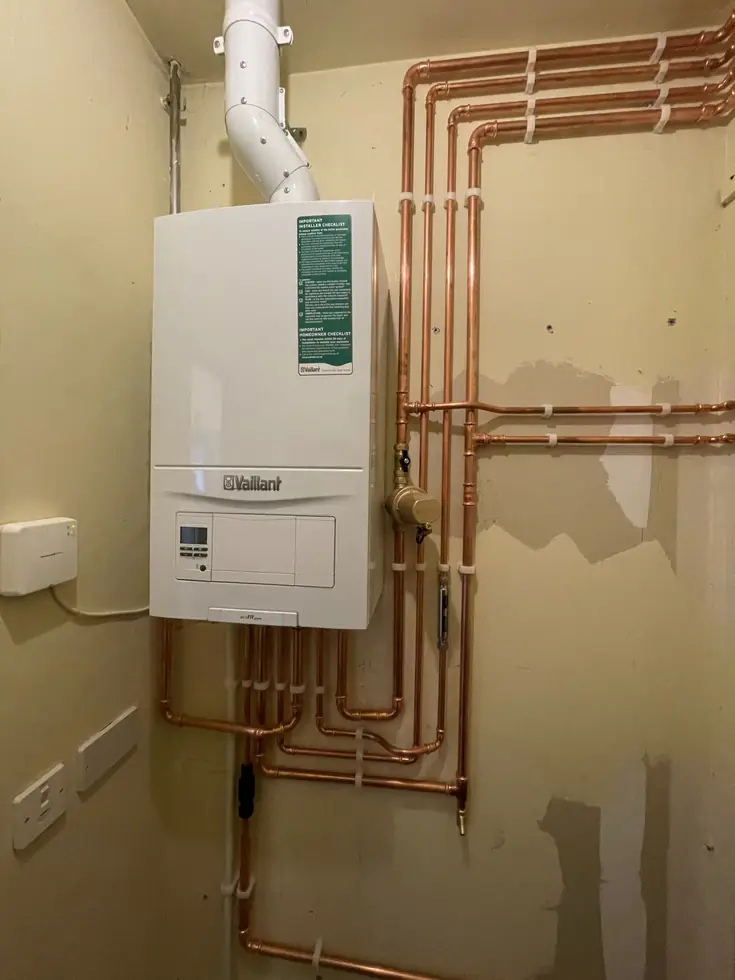 Vaillant combi boiler with a new flue and copper pipework